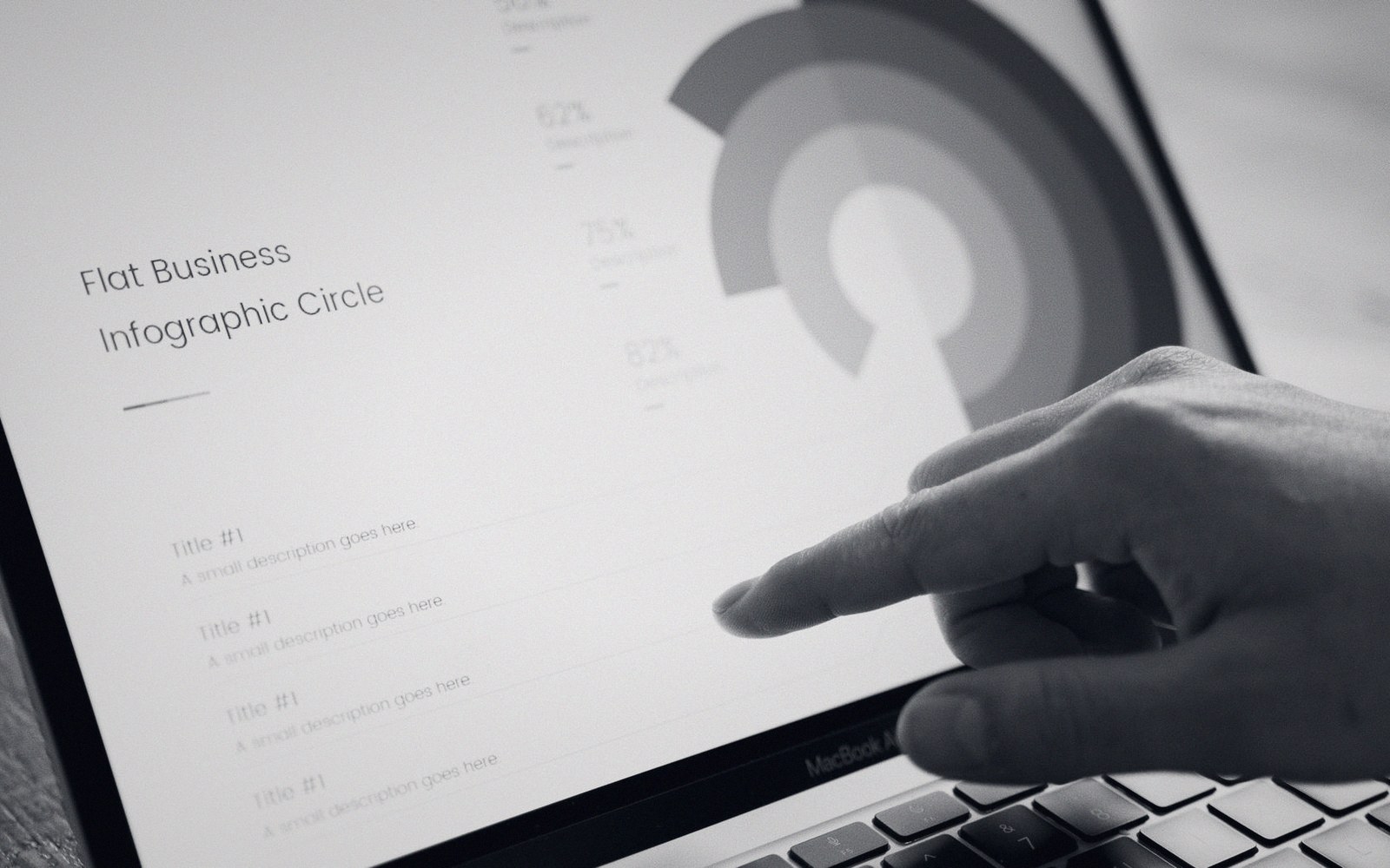 A finger touches a laptop screen displaying a circular business infographic with percentage statistics
